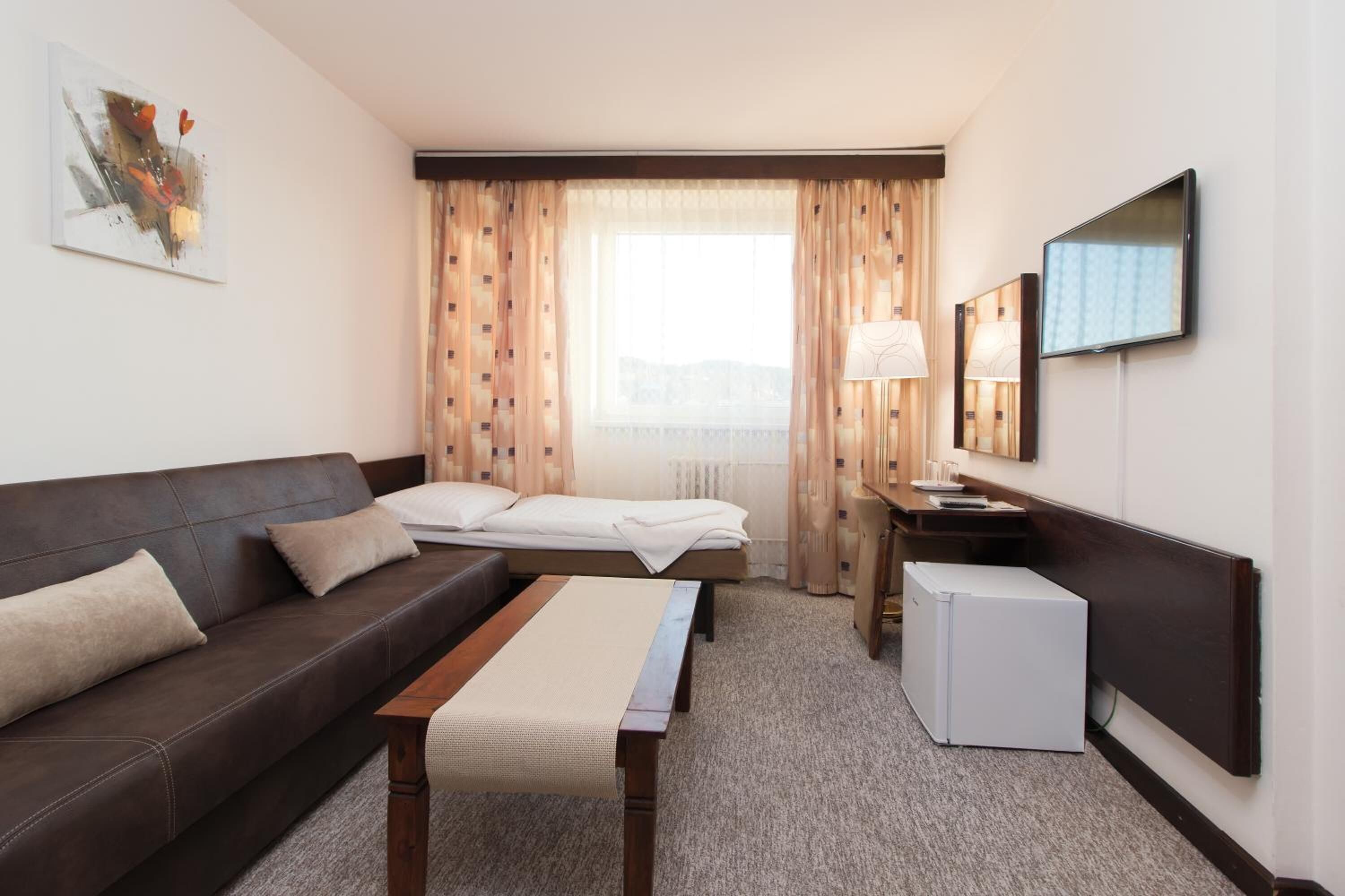 Desk, blackout drapes, iron/ironing board, free cribs/infant beds