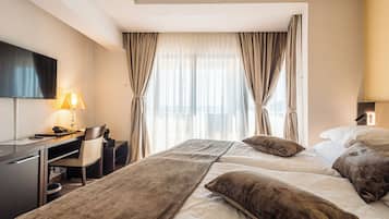 Premium bedding, minibar, in-room safe, desk