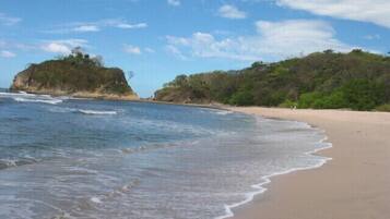 Beach nearby, white sand, beach yoga