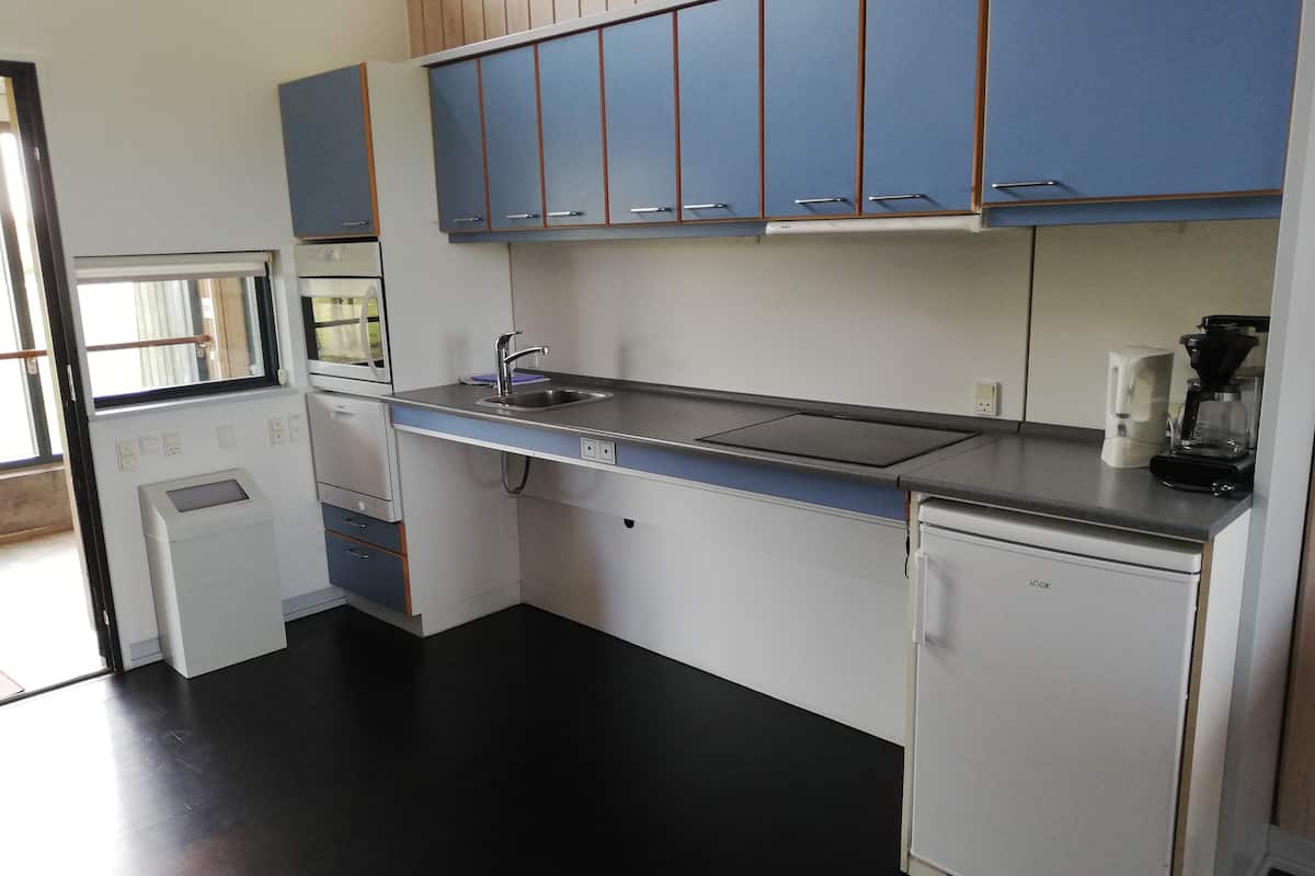 standard apartment, multiple beds, partial sea view | in-room dining