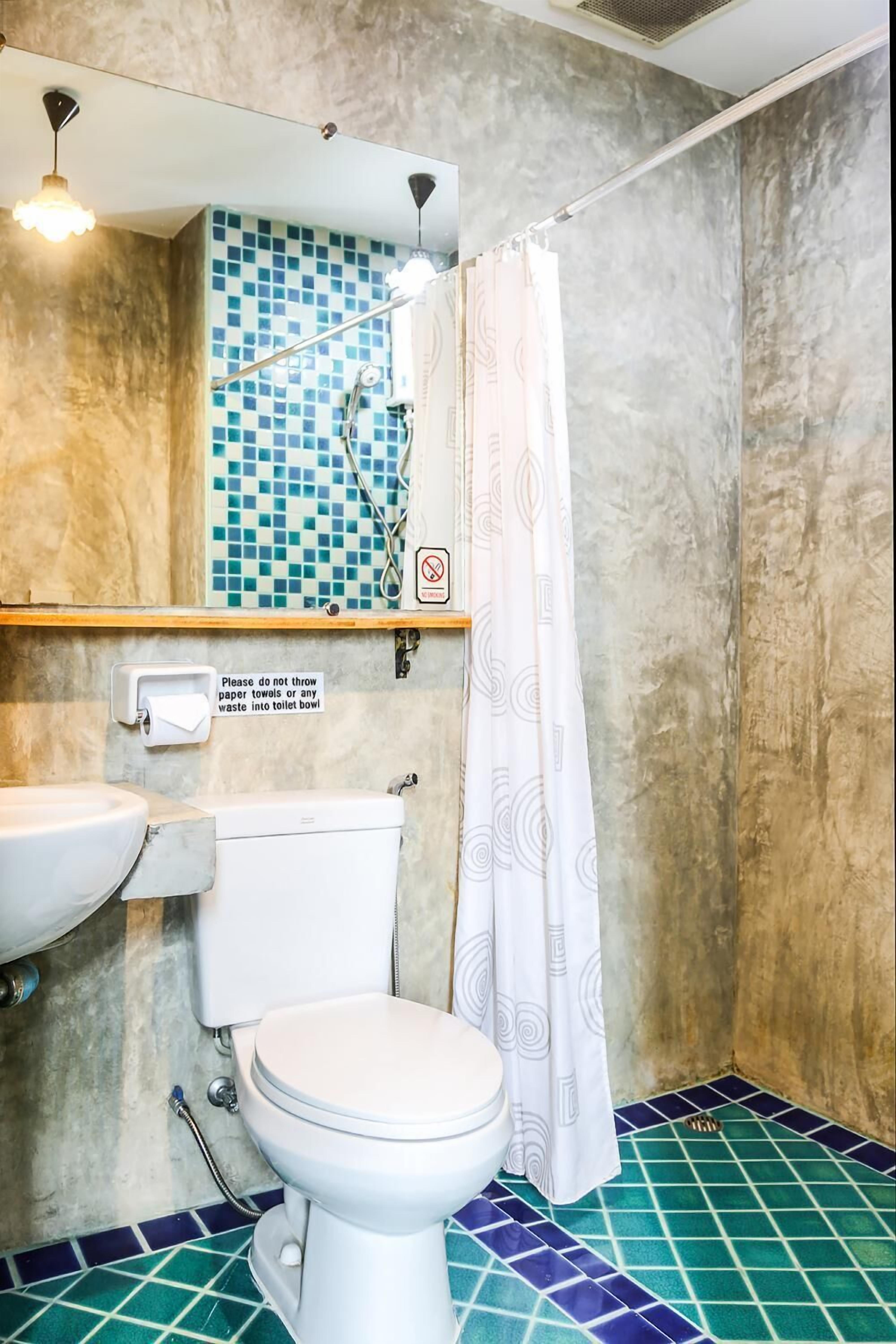 shower, slippers, towels, shampoo