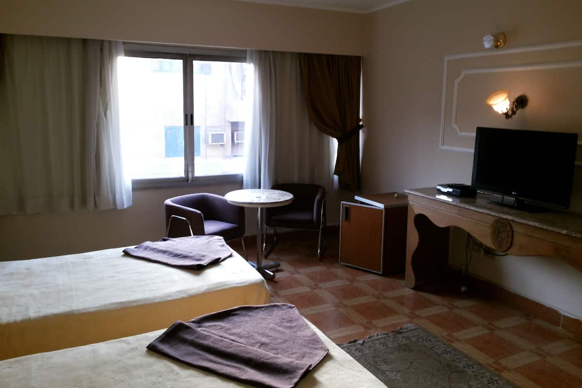 2 habitaciones, minibar y caja de seguridad en la habitación 