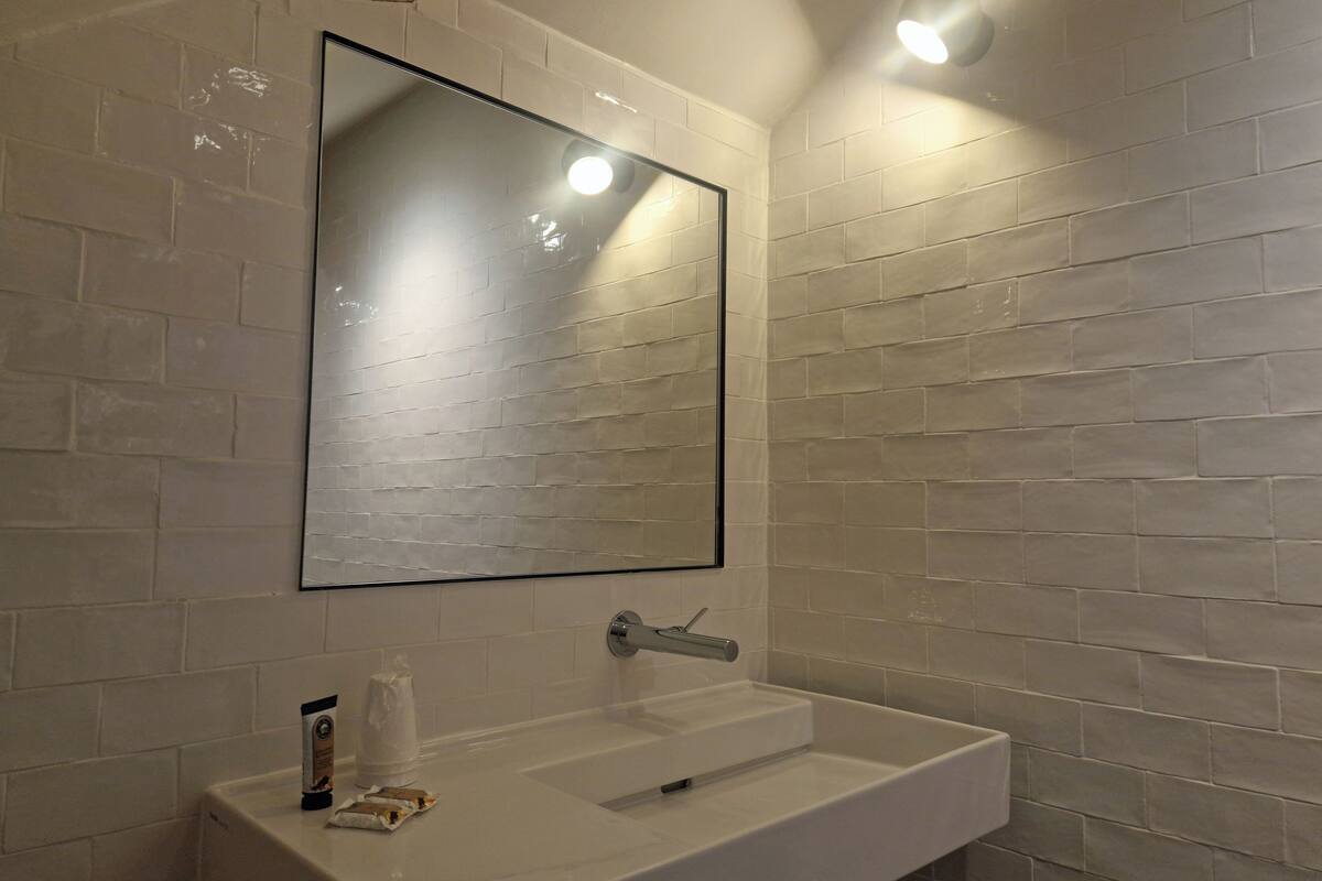 honeymoon room, 1 king bed with sofa bed, balcony, lake view | bathroom | free toiletries, towels, soap, shampoo