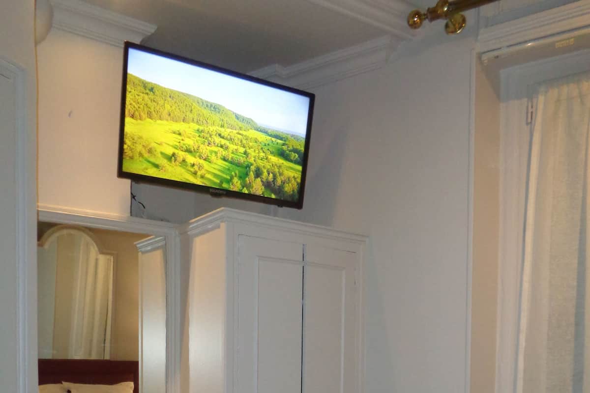 Eenpersoonskamer | Een kluis op de kamer, gratis wifi, beddengoed