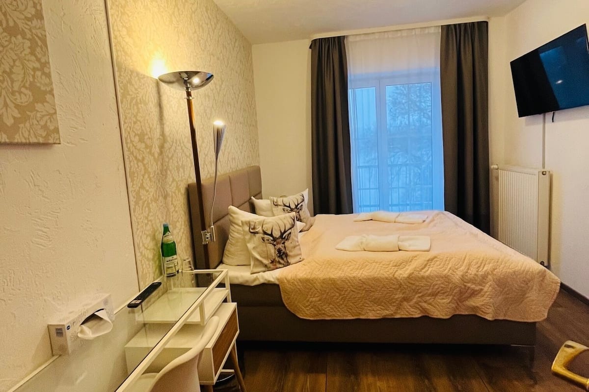 Desk, blackout curtains, free WiFi, bed sheets