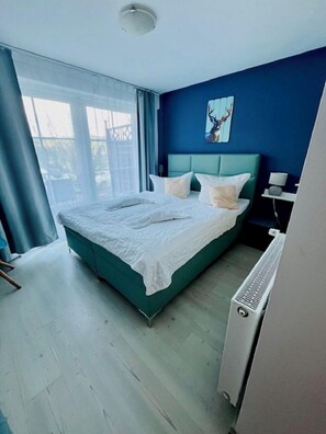 Habitación doble, patio (Small) | Escritorio, cortinas blackout, wifi gratis y ropa de cama