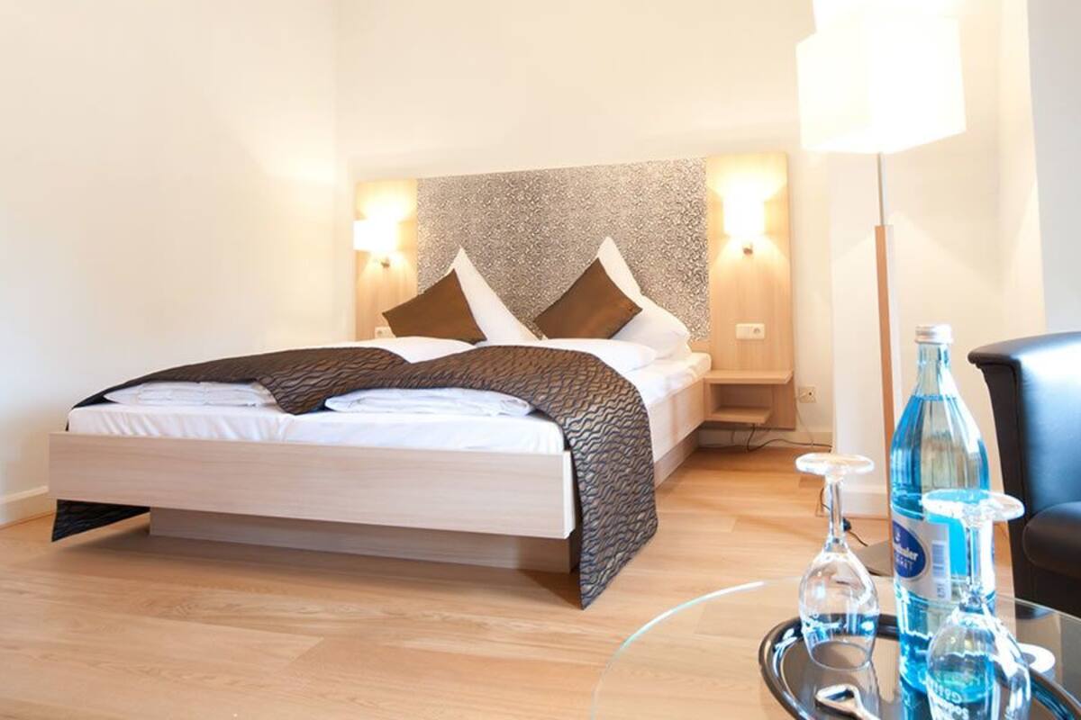 Deluxe Double Room | Minibar, in-room safe, individually decorated, individually furnished