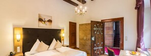 Deluxe Double Room | Minibar, in-room safe, individually decorated, individually furnished
