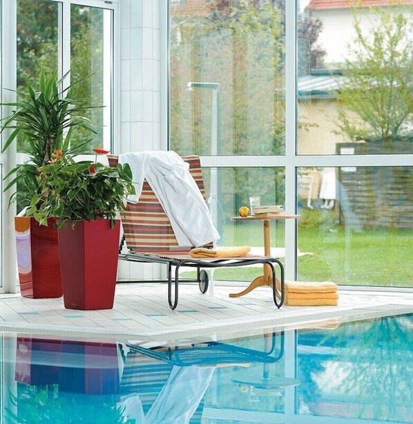 Indoor pool, outdoor pool, open 7:00 AM to 6:00 PM, pool umbrellas - Kurhotel Schatzberger (Bad Fuessing)
