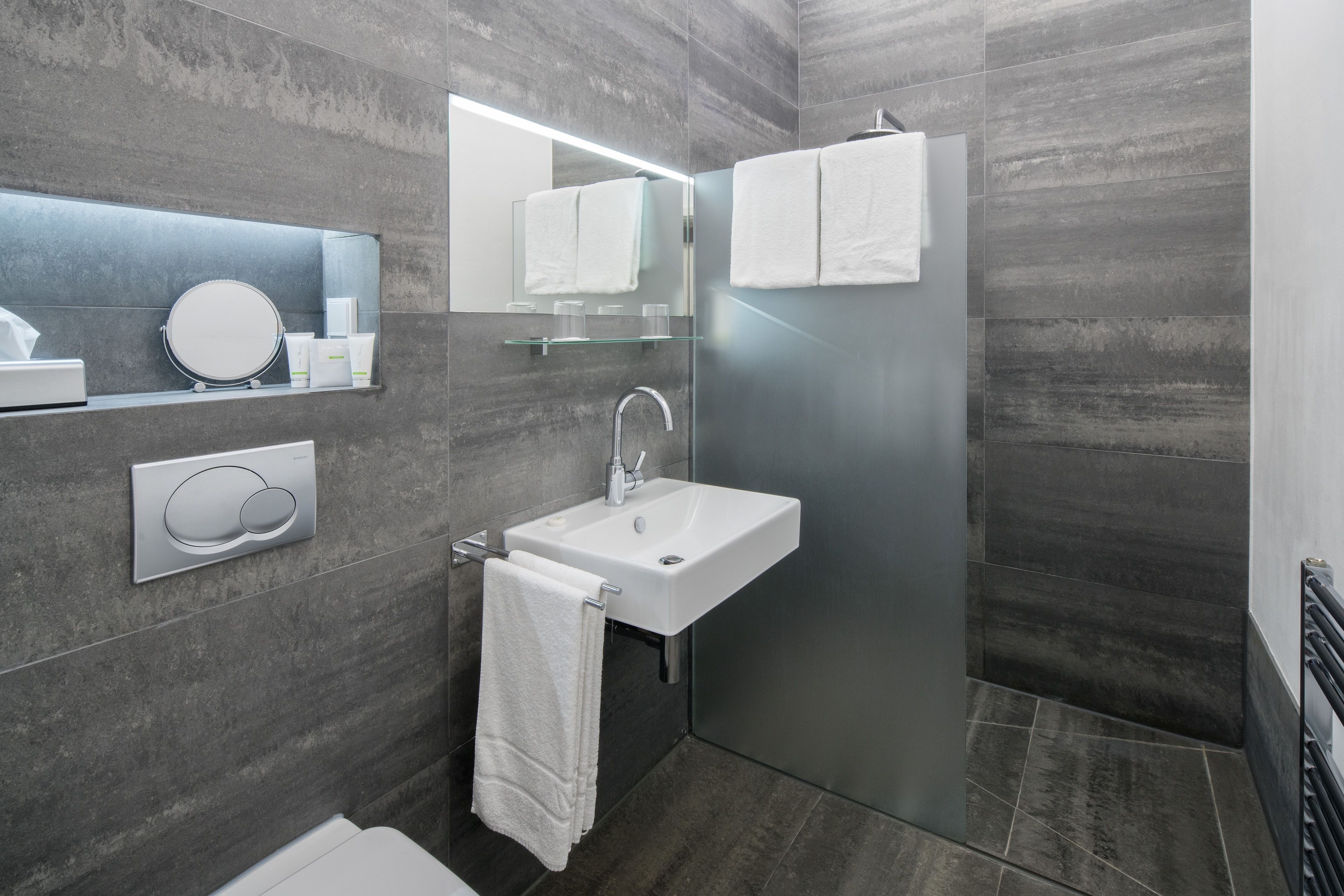 shower, free toiletries, hair dryer, towels