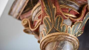 A close-up of ornate, intricately carved columns with a classical design.