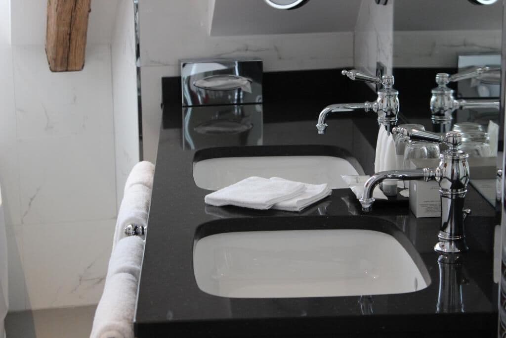 hair dryer, bathrobes, slippers, towels