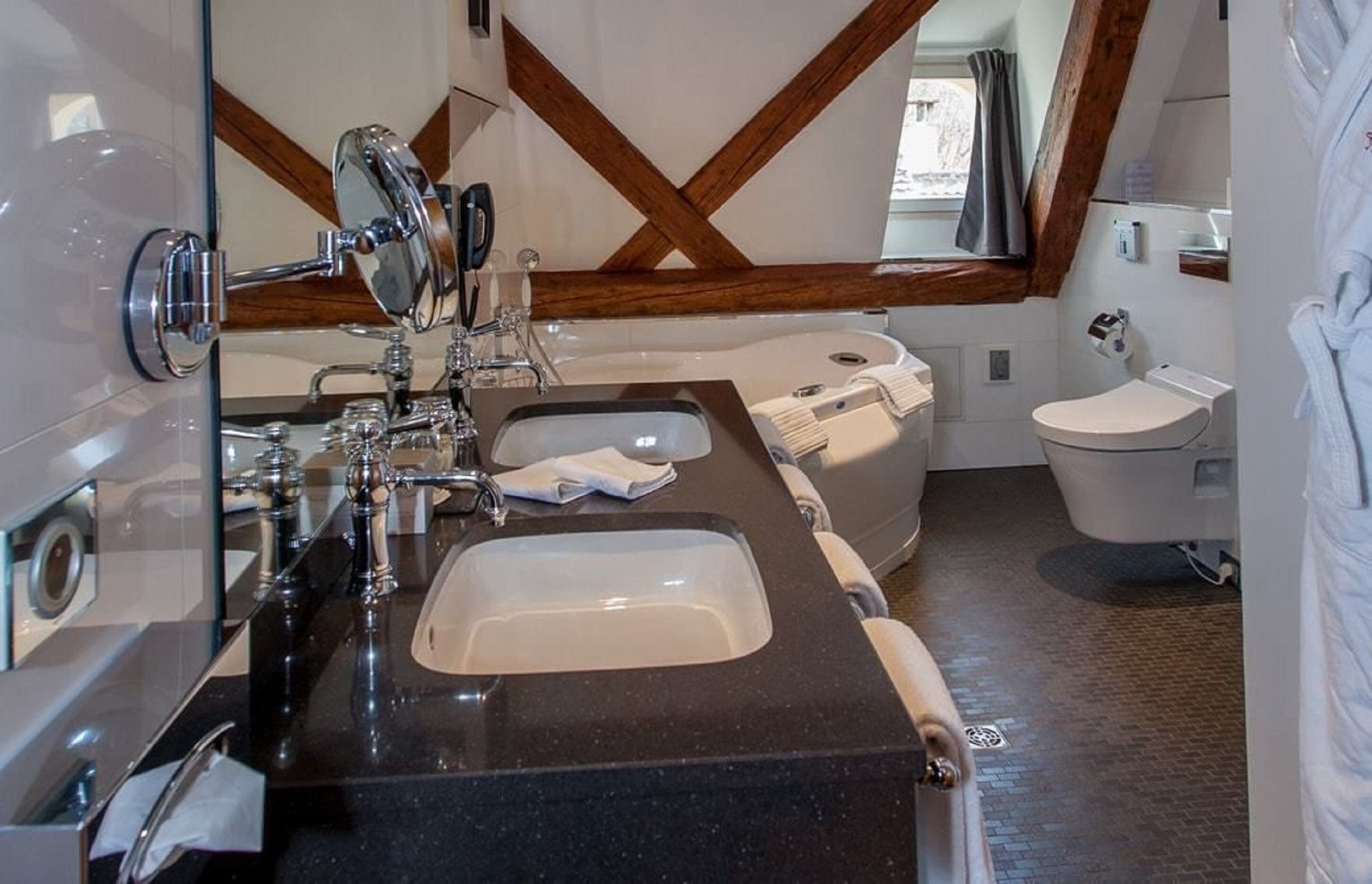 hair dryer, bathrobes, slippers, towels