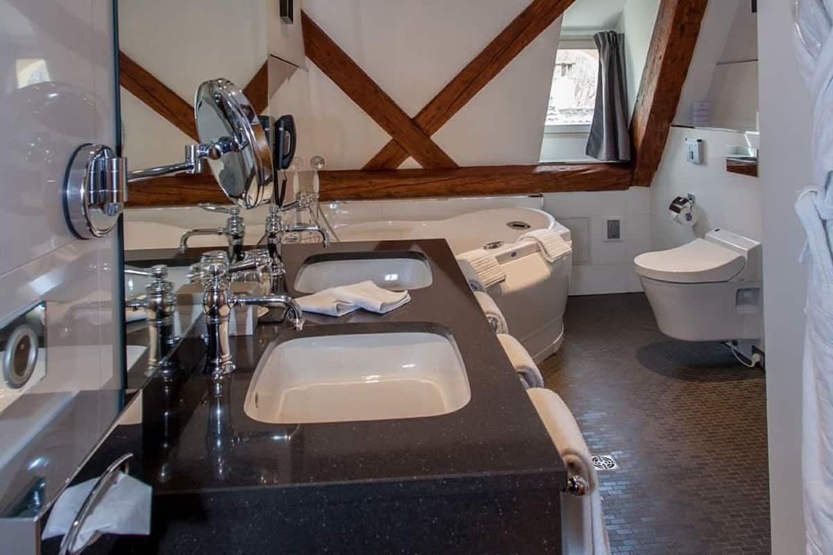 hair dryer, bathrobes, slippers, towels