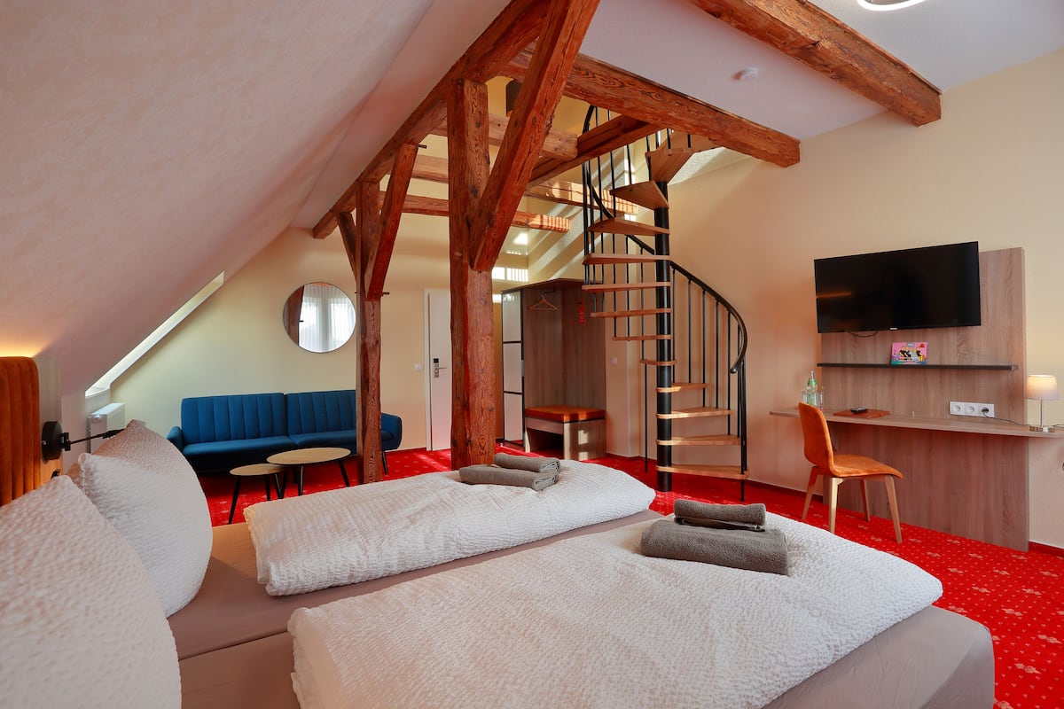 comfort quadruple room | living area | 32-inch flat-screen tv with satellite channels, tv