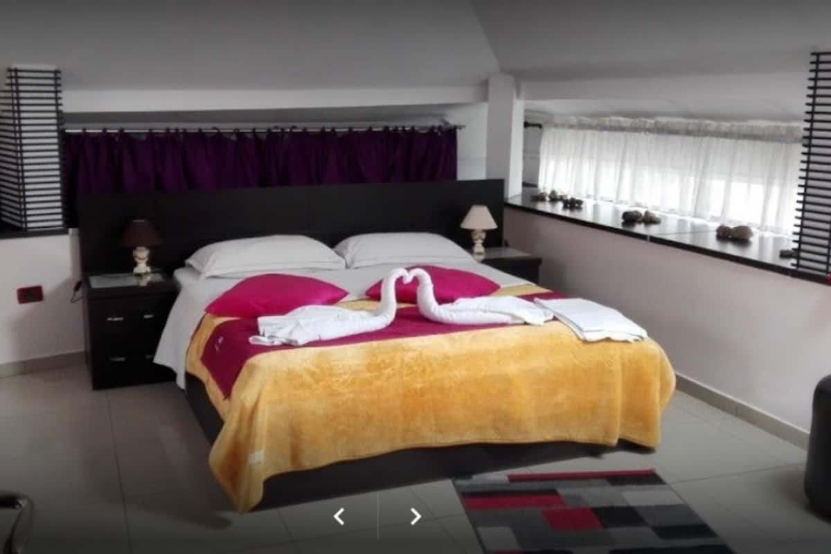 Family Triple Room, Multiple Beds | Minibar, in-room safe, desk, soundproofing