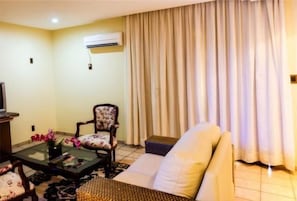 Suite (Master) | Sala de estar | Una televisión LCD