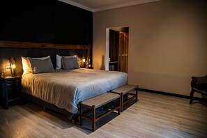 Superior suite | Donsdekens, Select Comfort-bedden, een minibar, een kluis op de kamer