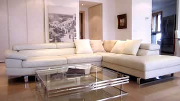 Exclusive Apartment, 3 Bedrooms | Living area | Flat-screen TV