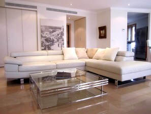 Exclusive Apartment, 3 Bedrooms | Living area | Flat-screen TV