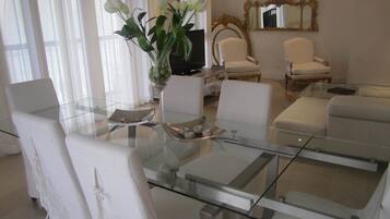 Exclusive Apartment, 3 Bedrooms | Living room | Flat-screen TV