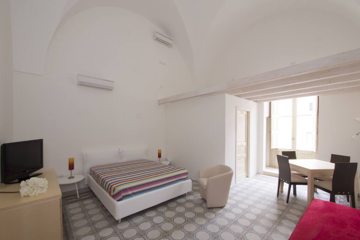 Premium bedding, down duvets, Select Comfort beds, minibar
