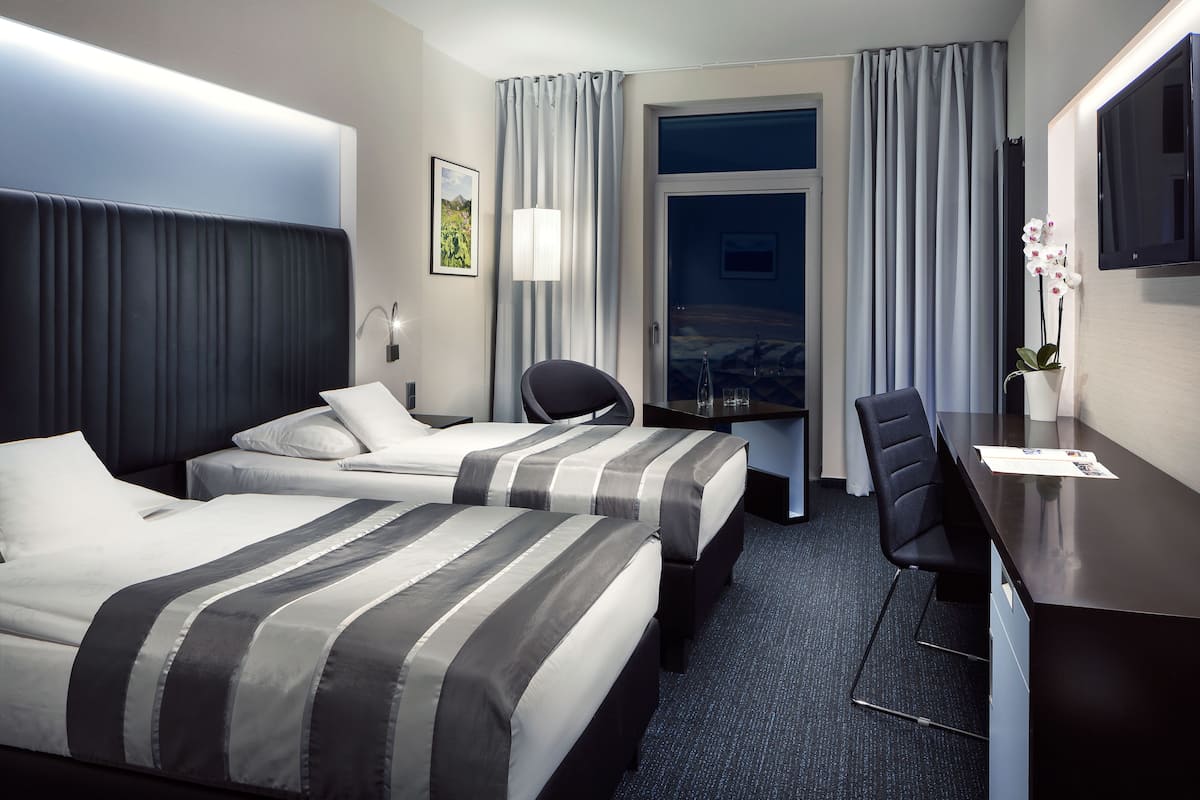 premium bedding, select comfort beds, minibar, in-room safe