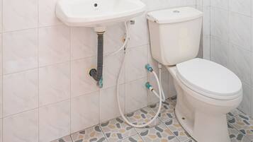 Standard Room (Fan ) | Bathroom | Shower, rainfall showerhead, towels
