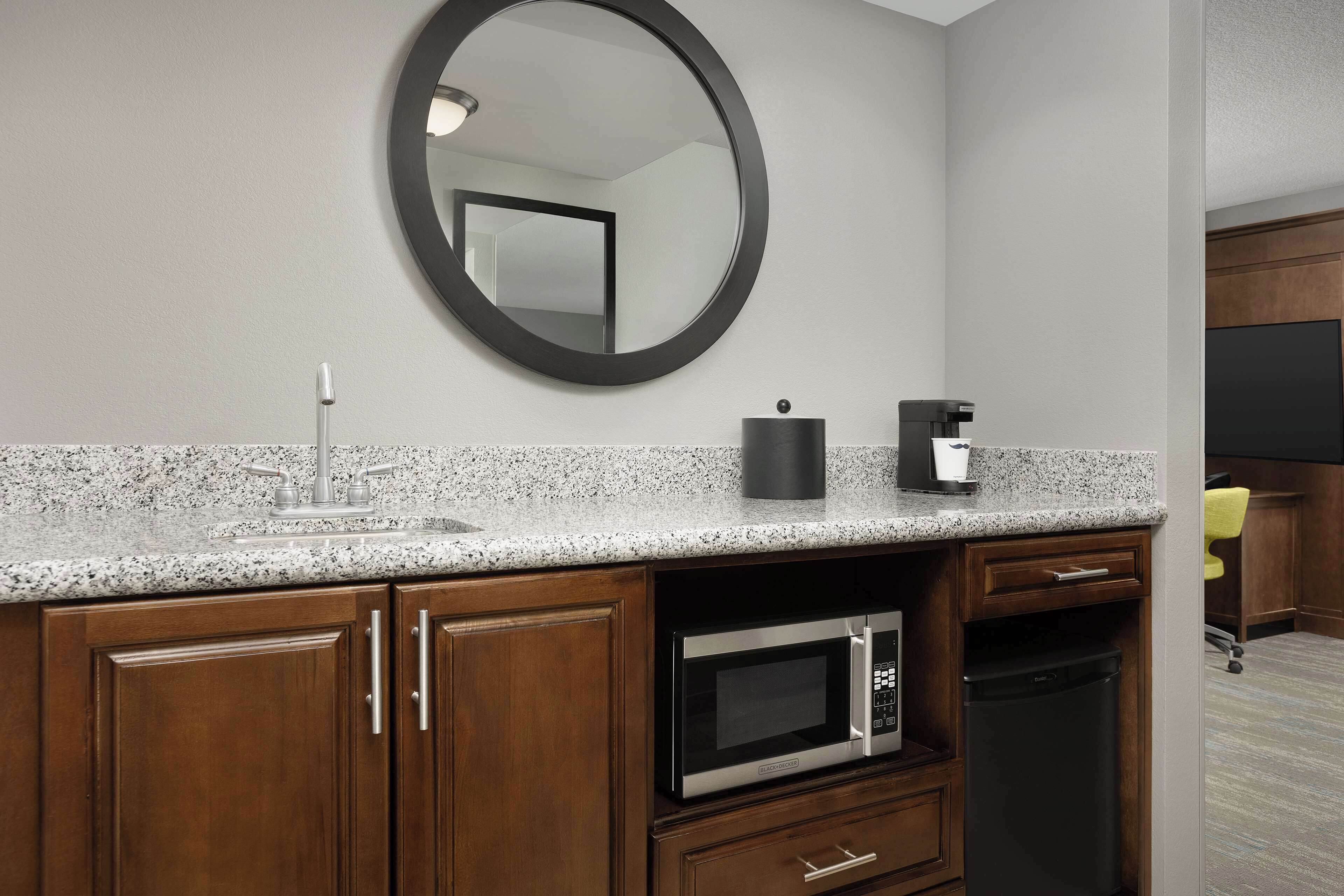 desk, laptop workspace, blackout curtains, iron/ironing board