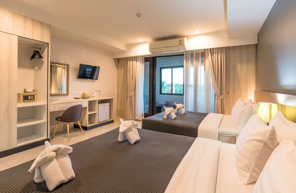 Deluxe Quadruple Room, Balcony | Free minibar, in-room safe, desk, rollaway beds - Lada Krabi Residence (Krabi)