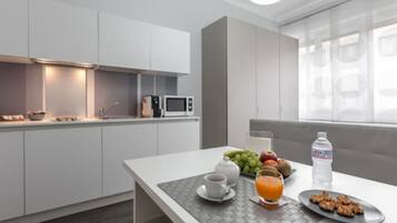 Mini-fridge, microwave, stovetop, electric kettle