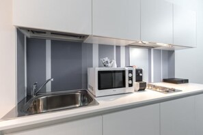 Apartment, 1 Bedroom | Premium bedding, down comforters, in-room safe, blackout drapes