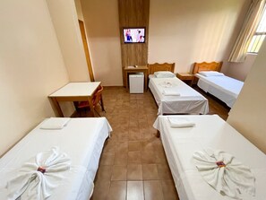 Comfort Quadruple Room | Hypo-allergenic bedding, minibar, desk, iron/ironing board - Hotel Almanara (Cuiabá)