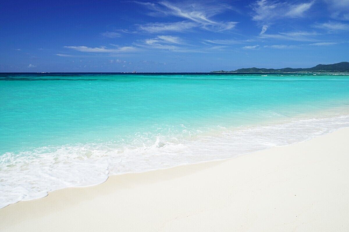 Am Strand, weißer Sandstrand, Kajakfahren