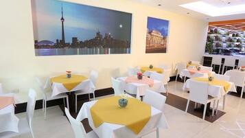 Daily buffet breakfast (USD 8 per person)