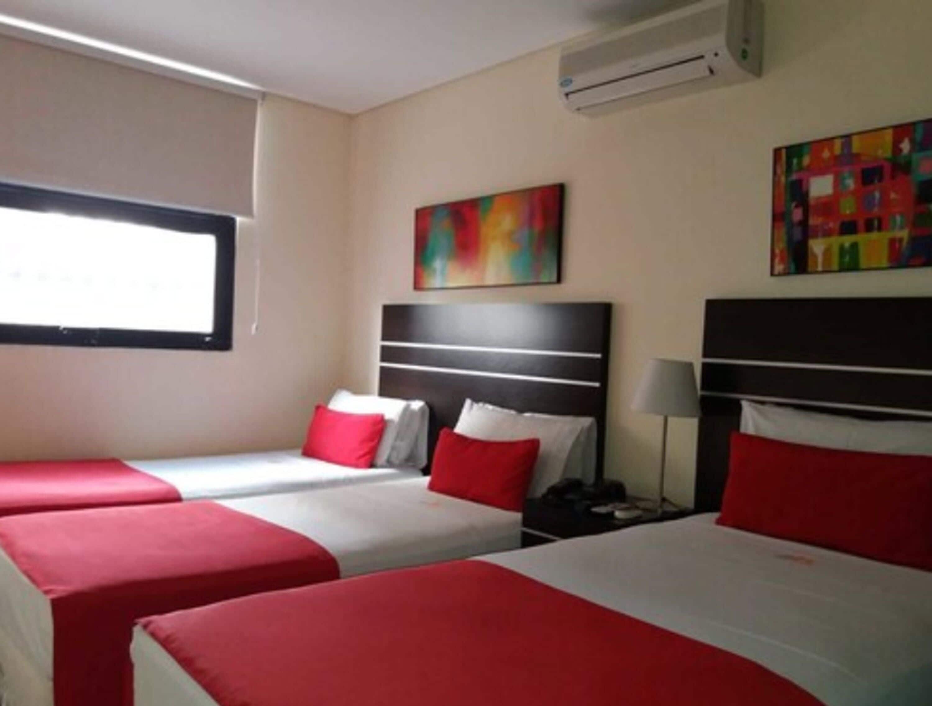 standard triple room, 3 single beds | 1 bedroom, minibar, in-room safe, individually decorated