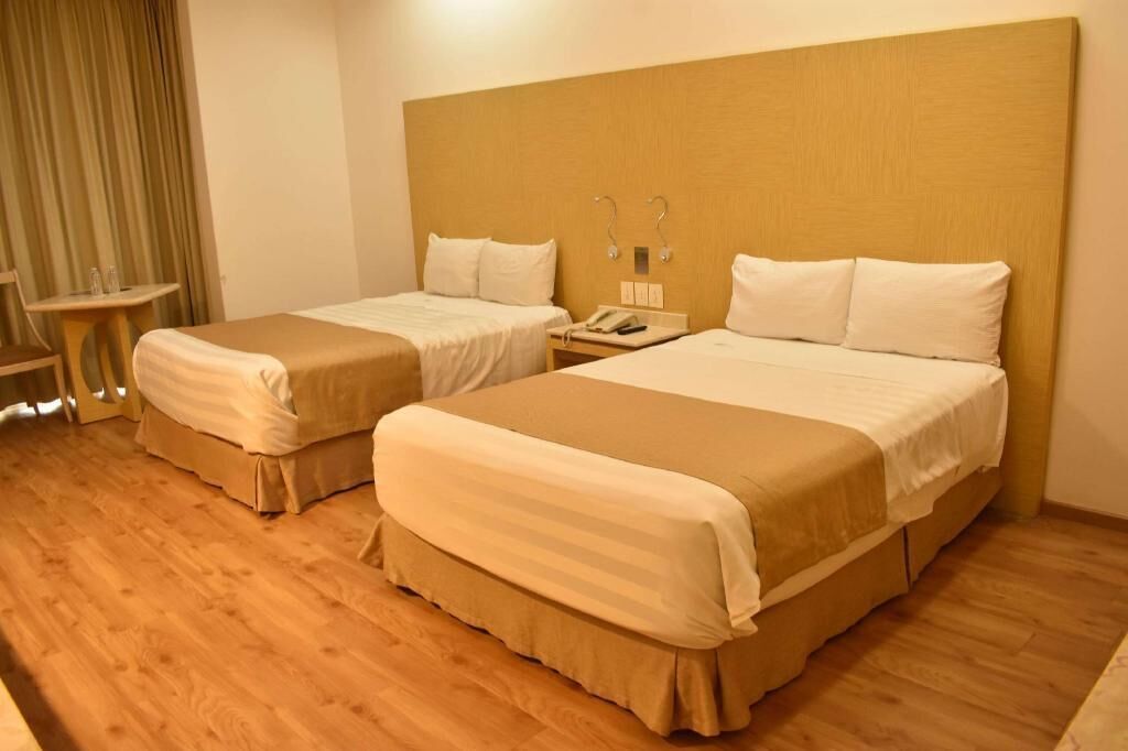 Down duvets, memory-foam beds, in-room safe, individually furnished