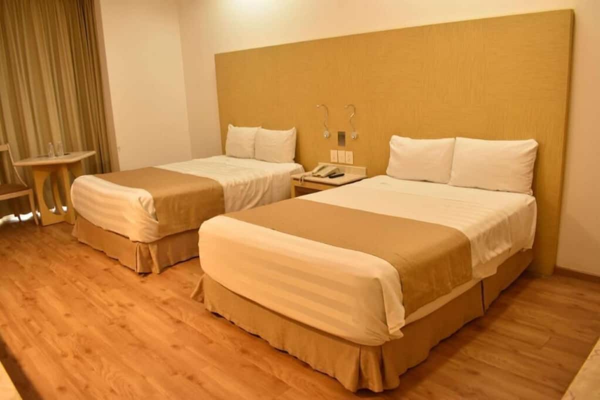 Down duvets, memory-foam beds, in-room safe, individually furnished