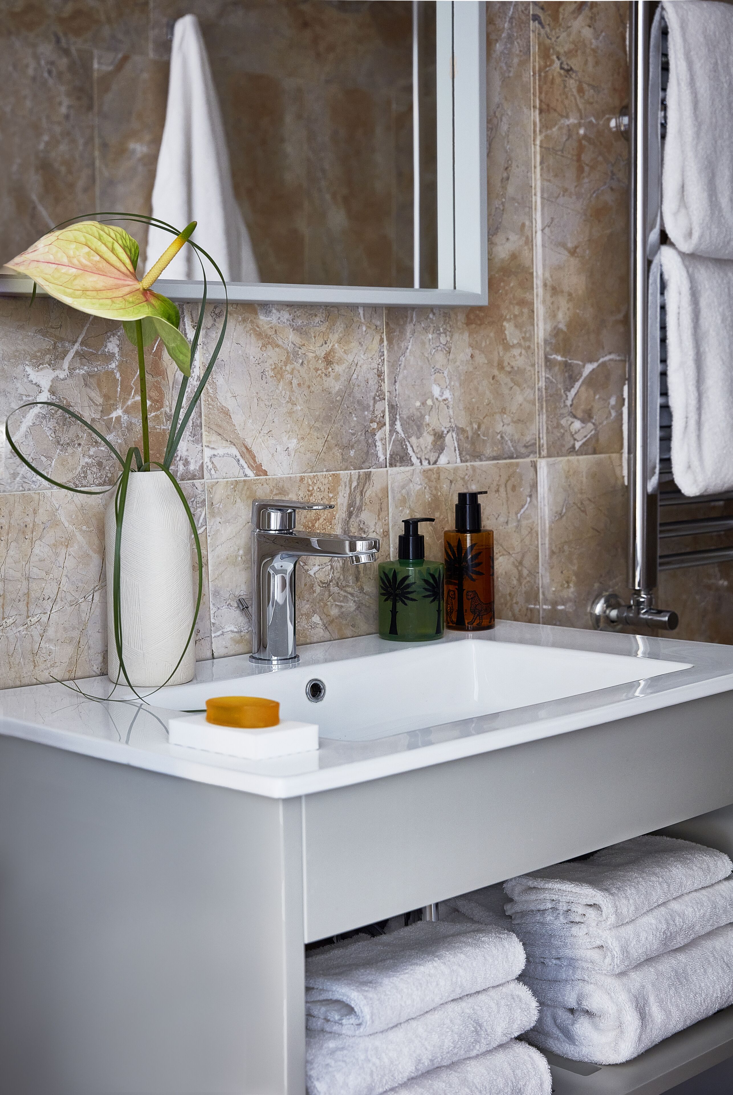 rainfall showerhead, hair dryer, slippers, bidet