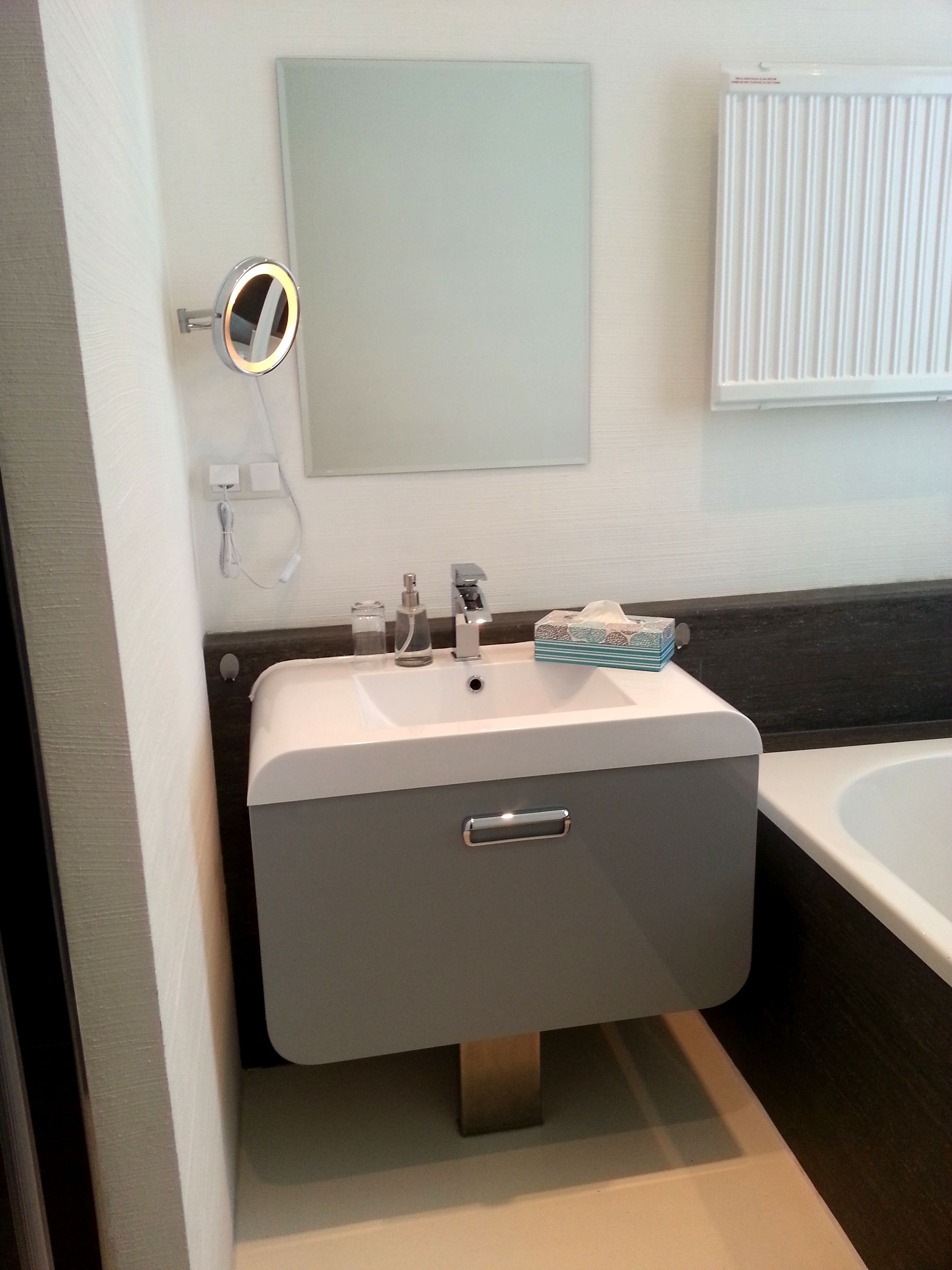 deluxe single room | bathroom | shower, rainfall showerhead, hair dryer, towels