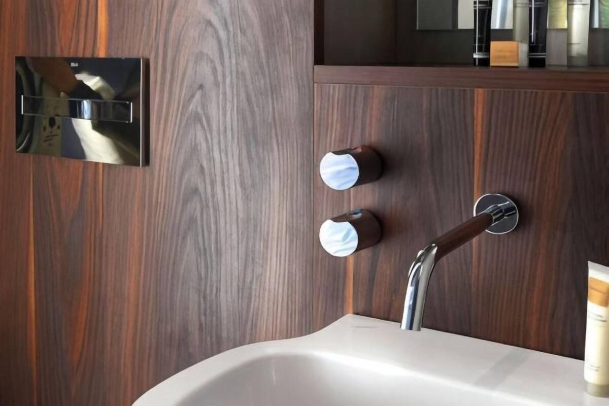 Bathroom | Shower, rainfall showerhead, eco-friendly toiletries, hair dryer