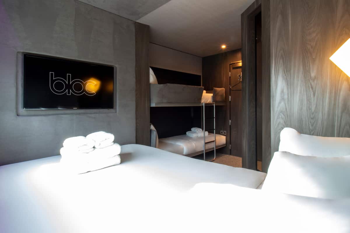 family room, one king bed and 2 bunk beds (only children age 12 or under can use the bunk bed)  | egyptian cotton sheets, premium bedding, soundproofing, free wifi