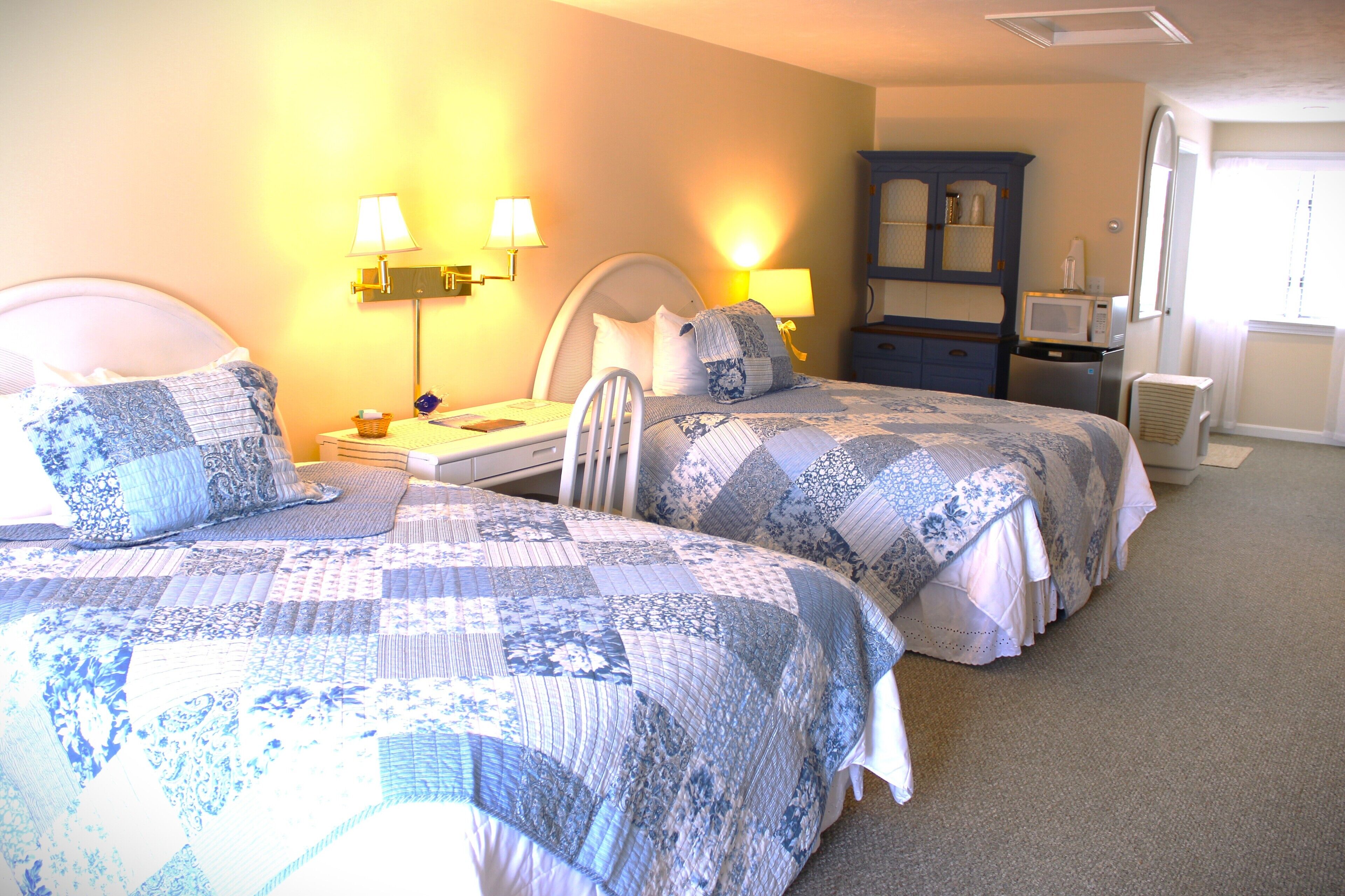 double room, 2 queen beds | individually decorated, individually furnished, laptop workspace