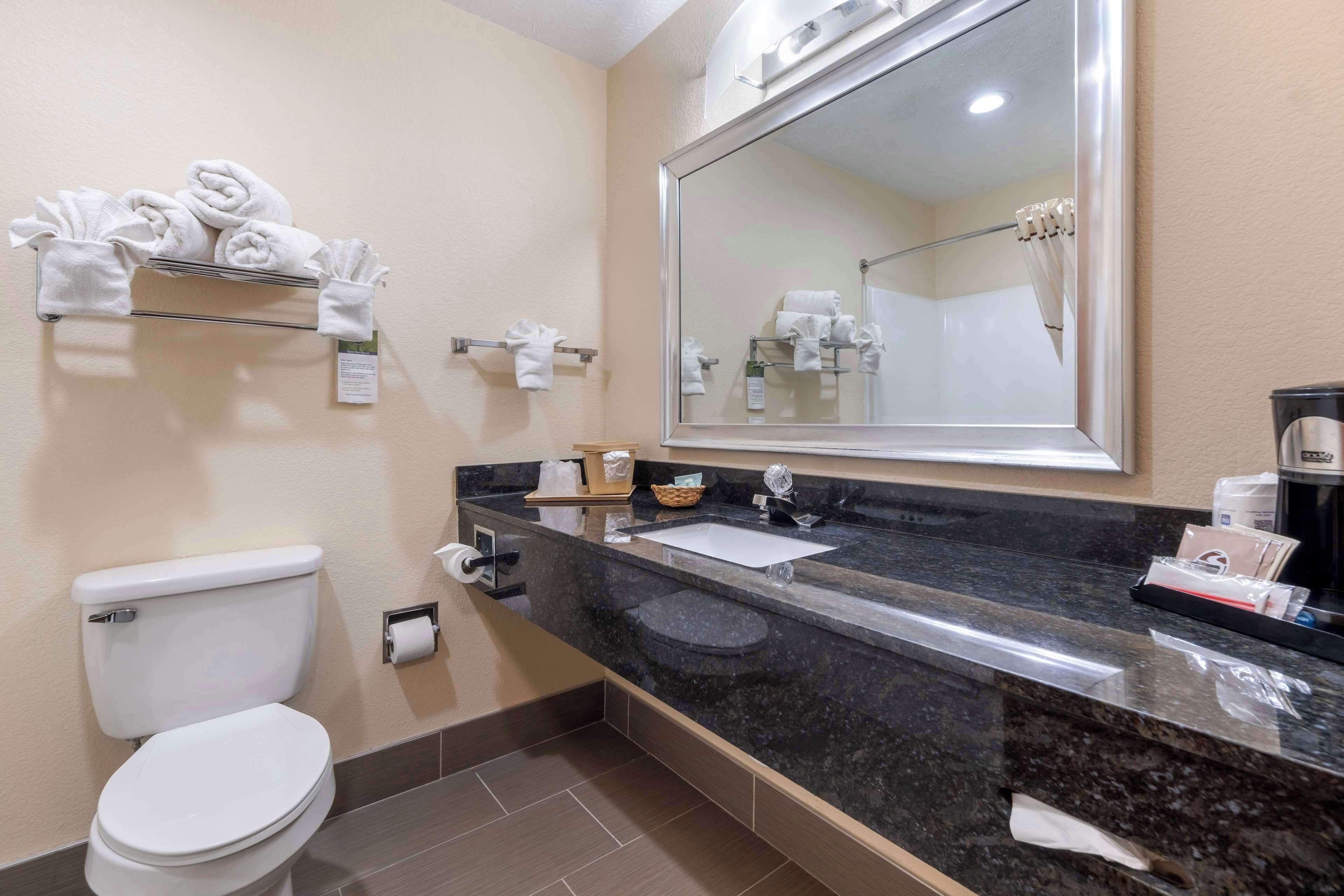 standard room, 2 queen beds, non smoking, refrigerator & microwave | bathroom | combined shower/bathtub, free toiletries, hair dryer, towels