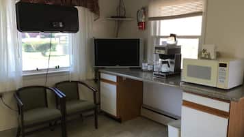 32-inch flat-screen TV with cable channels, TV