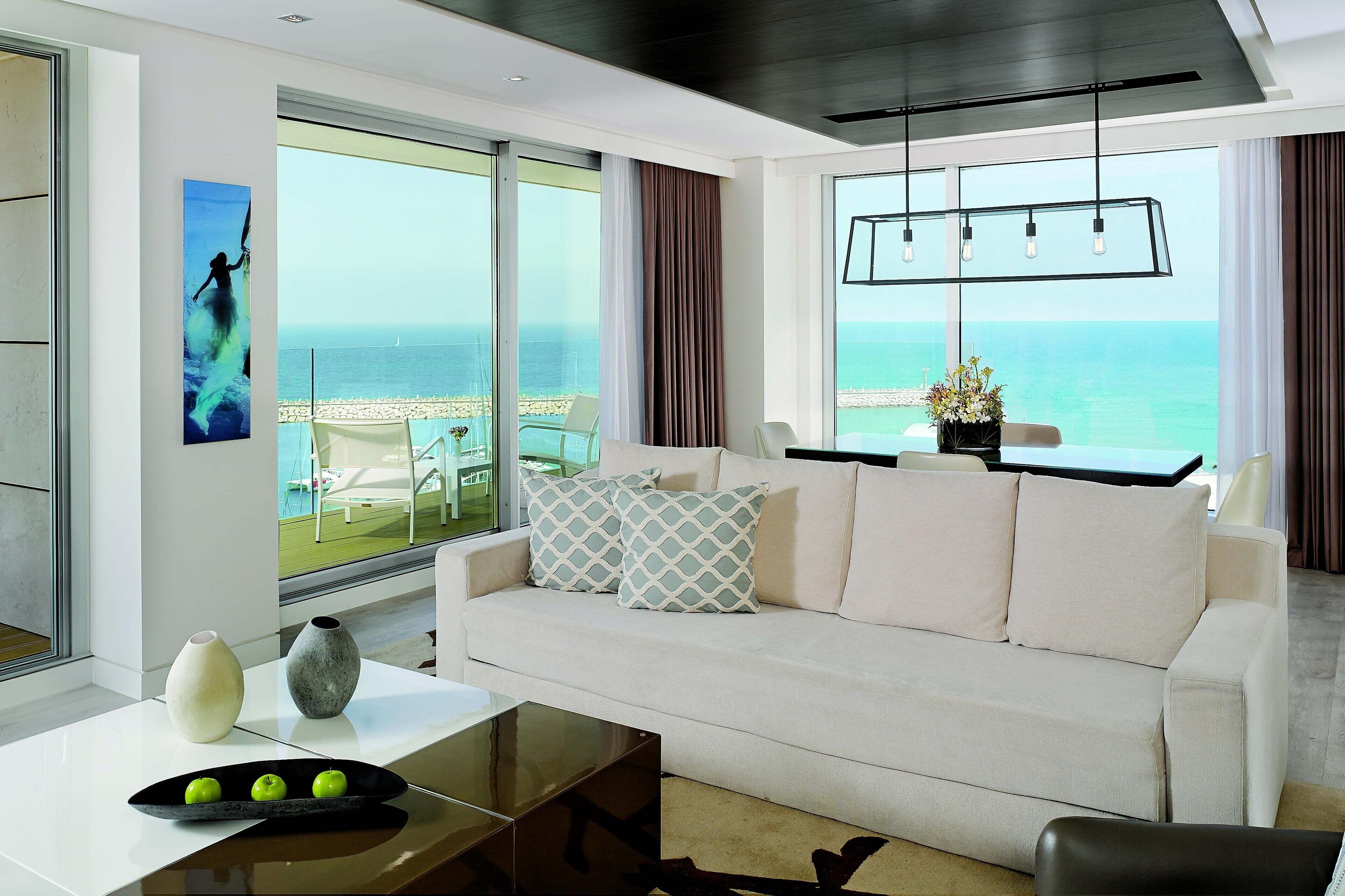 One Bedroom Suite, 1 King Bed, Sea View | Frette Italian sheets, premium bedding, minibar, in-room safe