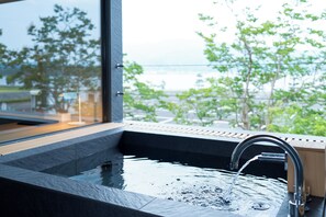 Luxury Room, Non Smoking, Bathtub (With wooden deck terrace 90m²) | Bathroom | Shower, free toiletries, hair dryer, slippers - Hotel Kitanoya (Miyazu)
