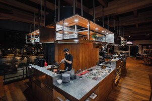 Breakfast, lunch, dinner served; international cuisine, beach views 