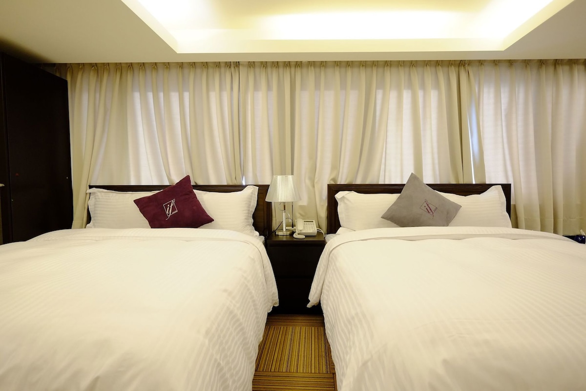 Down duvets, pillow-top beds, desk, blackout curtains