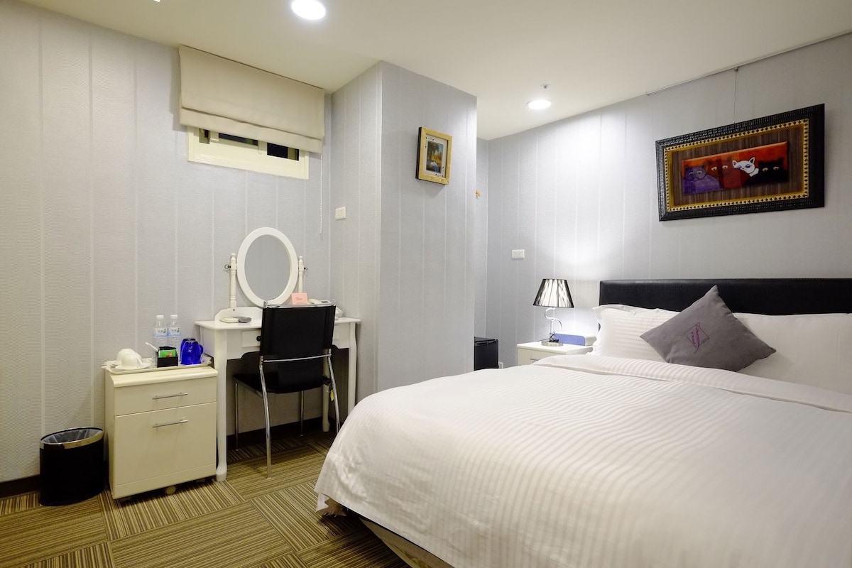 Down duvets, pillow-top beds, desk, blackout curtains